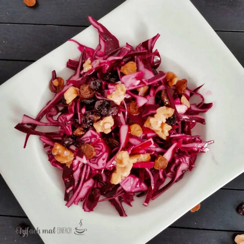 Red cabbage slaw with walnuts and raisins