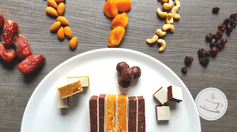 fruit bars and ingredients on and next to a plate