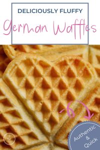 a close up of a heart shaped waffle