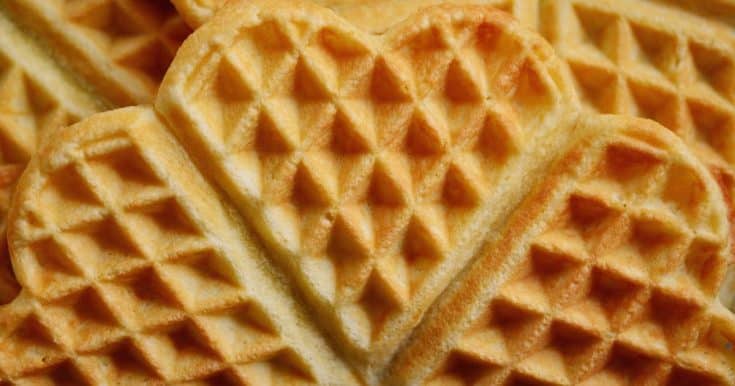 a close up of a heart shaped waffle